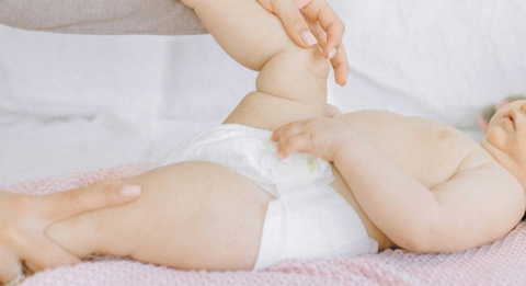 baby getting diaper changed