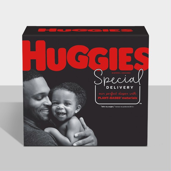 A box of Huggies Special Delivery diapers with a gray background